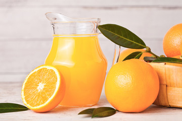 Glass jar of raw organic fresh orange juice