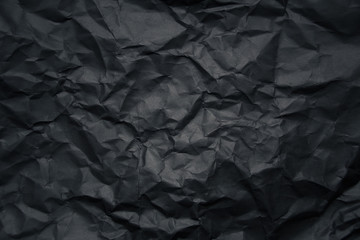 Blank crumpled black paper