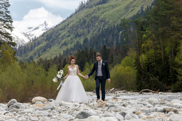 Beautiful couple in wedding day on the coast.