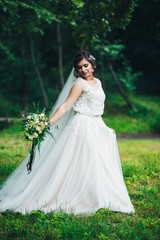 The bride is enjoying the bouquet