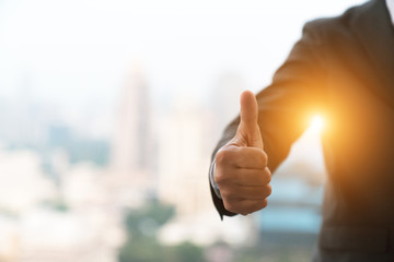 good hand, good job , man show thump up for agreement sign with success business concept.