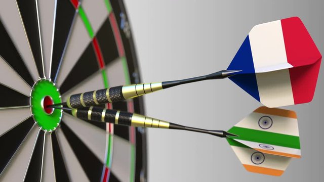 Flags of France and India on darts hitting bullseye of the target. International cooperation or competition conceptual animation