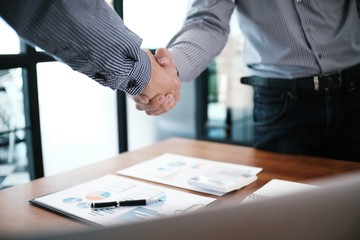 Image business mans handshake. Business partnership meeting concept.