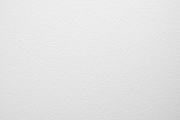 White textured wall background.