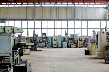 Fototapeta premium Large industrial hall. Turning equipment old machinery factory