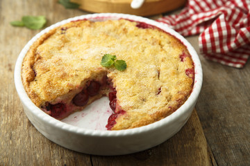 Homemade pudding cake with cherry