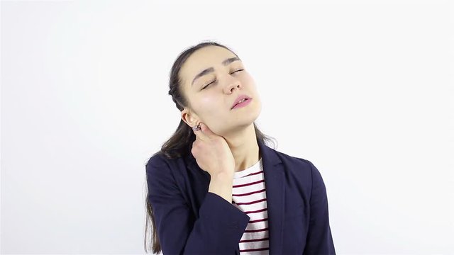 Young woman with pain in the neck joint