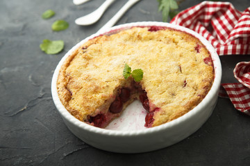 Homemade pudding cake with cherry