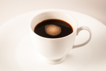 white cup of coffee