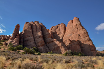 Fototapeta premium red rocks at the Sand Dune Arch trailhead Arches National Park, Moab, Utah