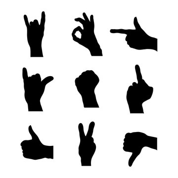 Set of detailed silhouettes of hands in different gestures on white