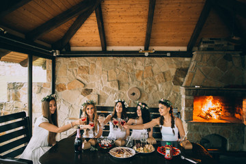 Girlfriends and bride celebrate hen party before the wedding