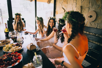 Girlfriends and bride celebrate hen party before the wedding