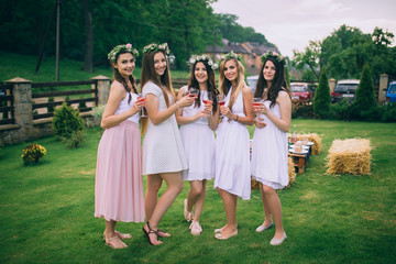 Fototapeta premium Girlfriends and bride celebrate hen party before the wedding