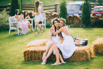 hen-party. Young beautiful girls having fun in the garden