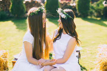 Obraz premium hen-party. Young beautiful girls having fun in the garden