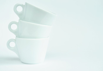 Three white coffee cups