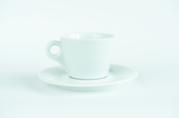 empty coffee cup and saucer on white background