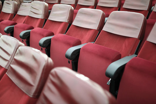 Red chairs in theater