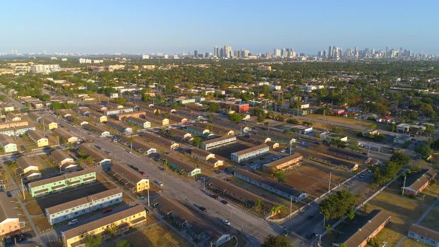 Aerial forward motion drone footage Miami urban housing projeccts Liberty City Square 4k 30p