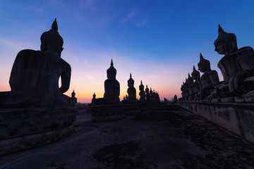 Big buddha statue in beautiful sunrise or sunset at  Nakhon si thammarat Province, Thailand.