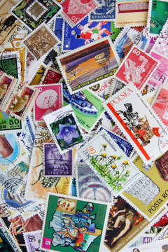 Old post stamps from various countries and times. Mix collection as background