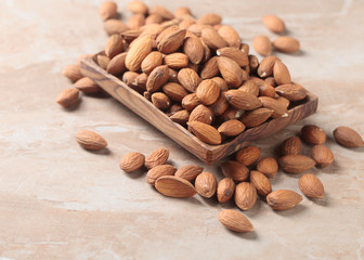 Almonds in old wooden dish