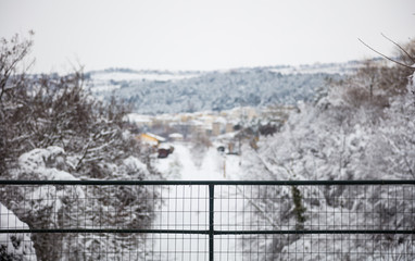 Christmas, winter concept. Snowy distant blur view of village and nature