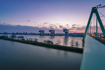 High tight in Cologne during blue hour with Kranh&auml;user in background