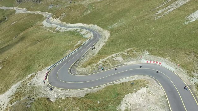 Aerial view of people longboarding on Transalpina 