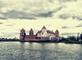 Mir Castle in cloudy weather. Toning