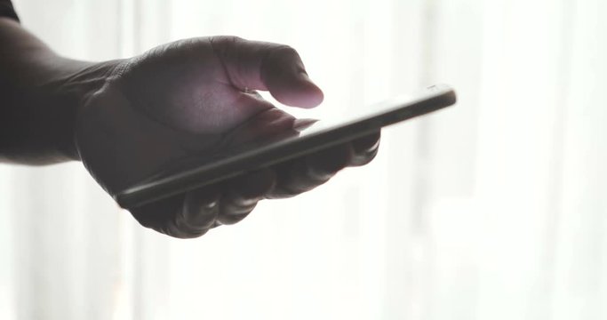 Close up the hand using smartphone touching display screen , 4K Dci resolution