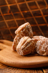 Delicious fresh gingerbread on a texture board for filing on a wooden background. Russian mint gingerbreads on wooden background.