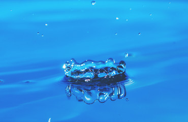 abstract background of Blue water drop falling down