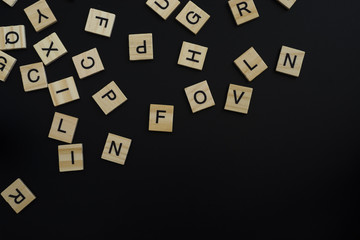 Wood Letter on black