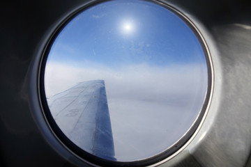 Fototapeta premium Airplane wing.Clouds and sky