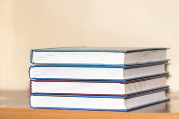 Pile of books on a light background