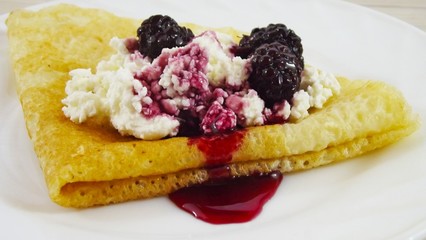 Homemade pancakes with cottage cheese and BlackBerry jam.