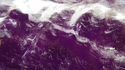 Abstract background.Ice on purple background.