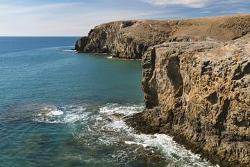 Fototapeta na wymiar Playa Mujeres Cliffs in Lanzarote, Spain