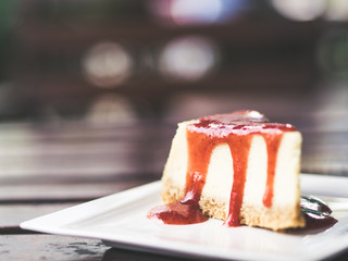 Close up of Strawberry Cheesecake served in cafe.