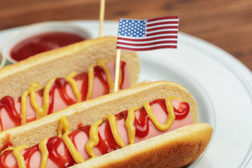 Hot dogs on wooden background