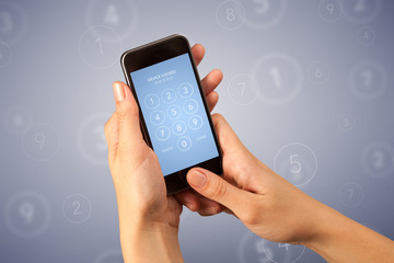 Female fingers touching smartphone with locked device requiring passcode