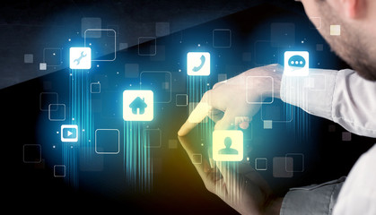 Modern smart table with high tech icons on its interface screen concept