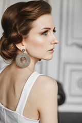 Portrait of glamorous and fashionable brunette model girl