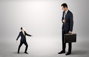 Conflict between small masked businessman and big elegant businessman
