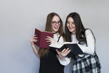 Two female students with books