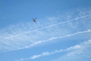helicopter on blue sky
