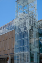 Modern glass building with tower