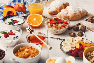 Continental breakfast menu on woden table